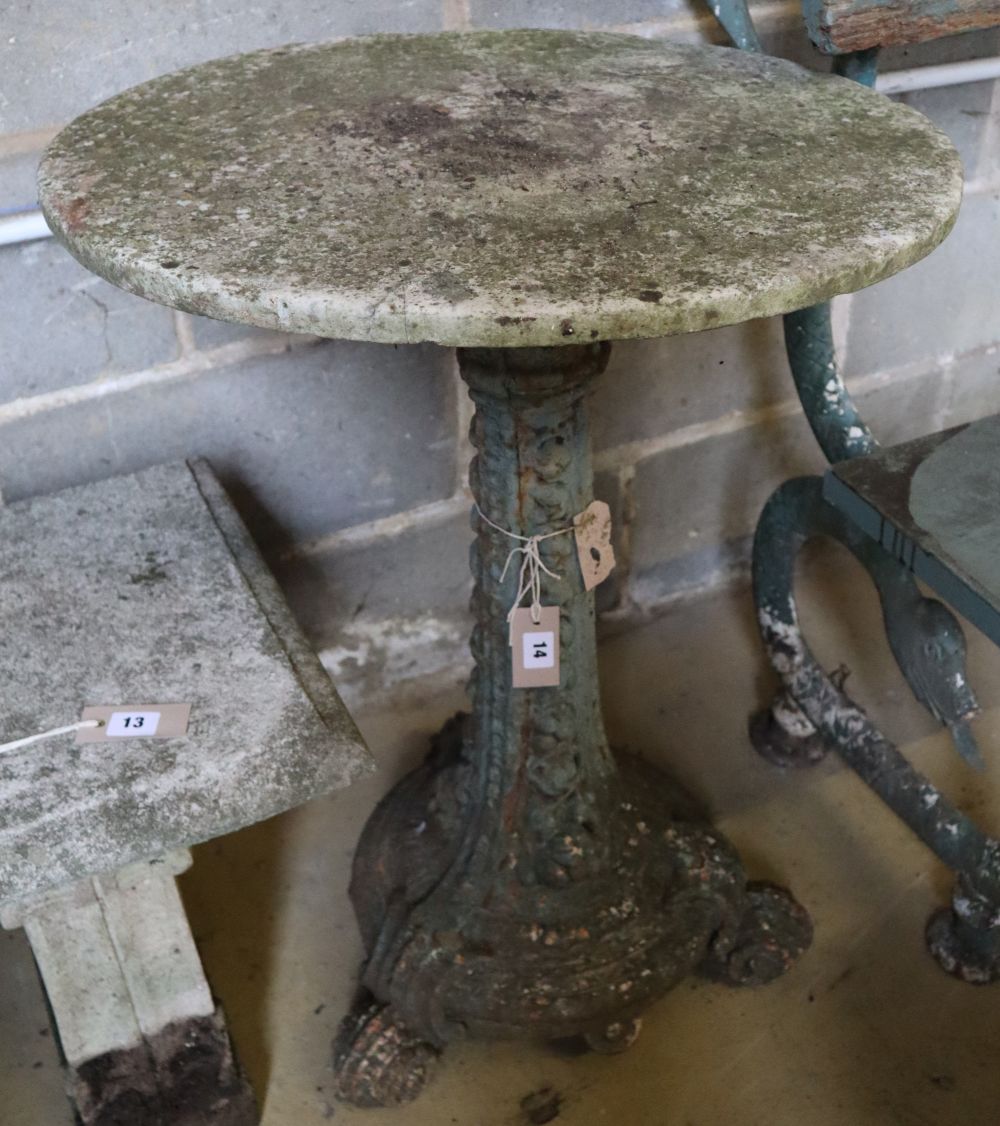 A Victorian cast iron garden table with marble top, 58cm diameter, height 76cm